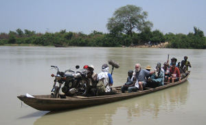 David Bellamy and our intrepid team cross the White Volta in 2007 for the Singa Festival