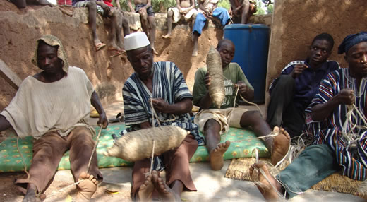 The men of Logshegu village in Ghana making string and rope from local plants